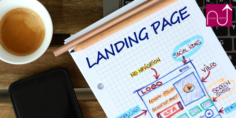 landing page rough sketch on writing pad