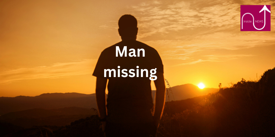 silhouette of a man looking at sunset