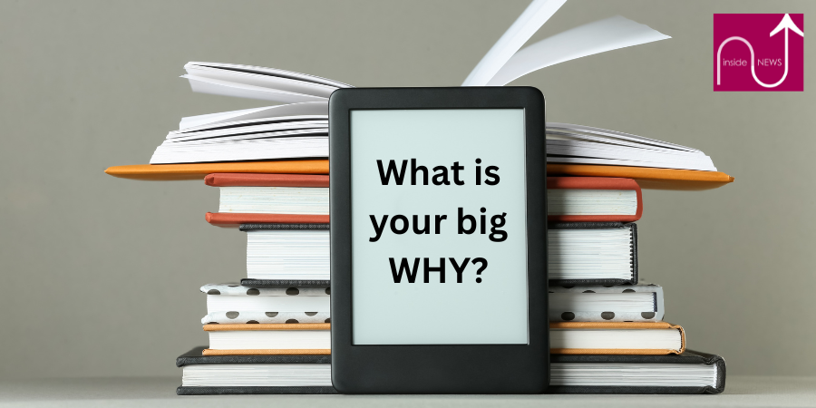 pile of books with tablet in front