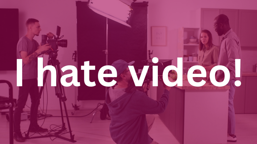 young lady and man with video recording in background